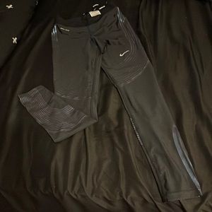 Size small various Nike running tights